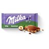Milka Czekolada mleczna z kawałkami orzechów 100 g