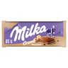 Milka Creme Czekolada mleczna z nadzieniem z orzechów laskowych 85 g stokrotka.pl